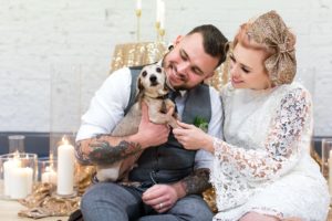 Yorkshire wedding venue couple holding little dog
