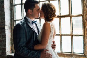 Studio 2 Yorkshire Wedding Venue River Mills Ballroom couple kissing
